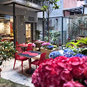 努鲁子​​牙套房酒店 酒店